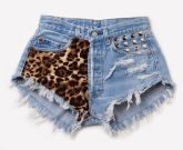 Short estampa onça